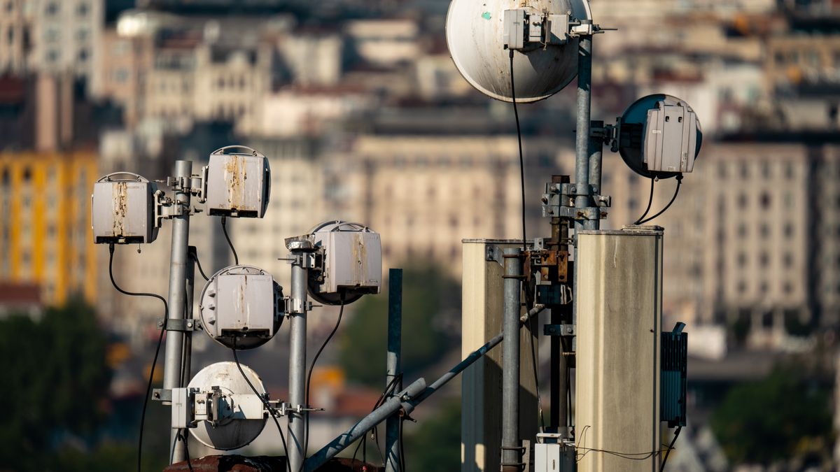 Telecommunication antennas on a rooftop in Istanbul, showcasing modern urban infrastructure.